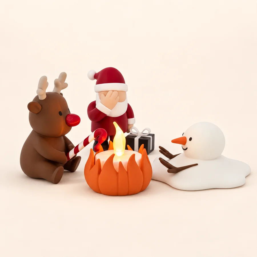 Christmas Campfire Dekoration mit Rudolf, Weihnachtsmann und schmelzendem Schneemann rund um ein leuchtendes LED-Lagerfeuer